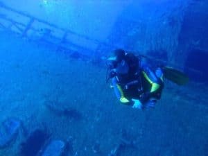 Diver On The Zenobia Wreck
